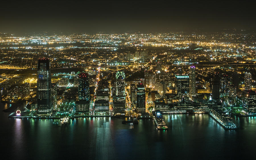 Aerial night View of Jersey City Photograph by Michael Lee