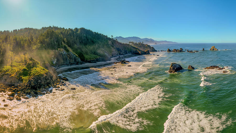 Near sunrise aerial 3-photo pano hovering over the ocean off Ecola Park and Crescent Creek Beach Photograph by Chris Anson