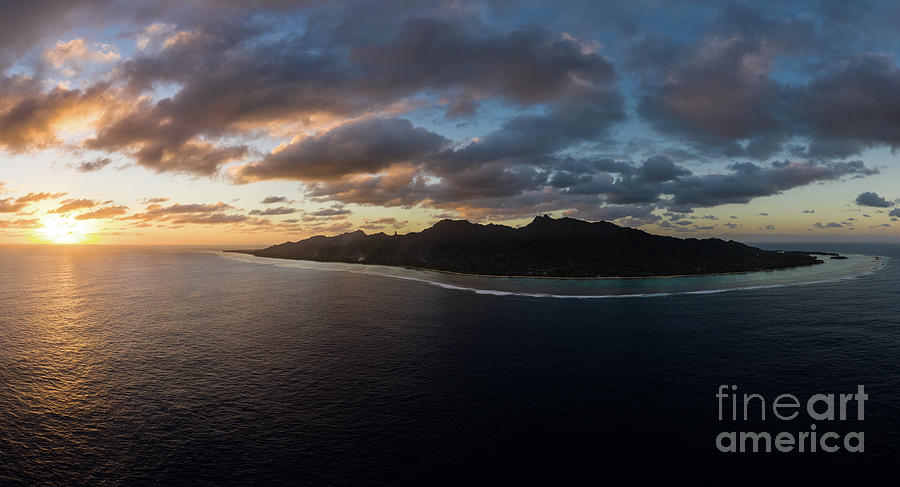 Aerial panorama of the entire Rarotonga island during a dramatic Photograph by Didier Marti