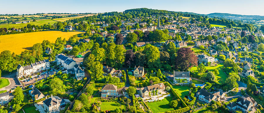 Aerial panorama over country homes in picturesque summer village Cotswolds Photograph by fotoVoyager