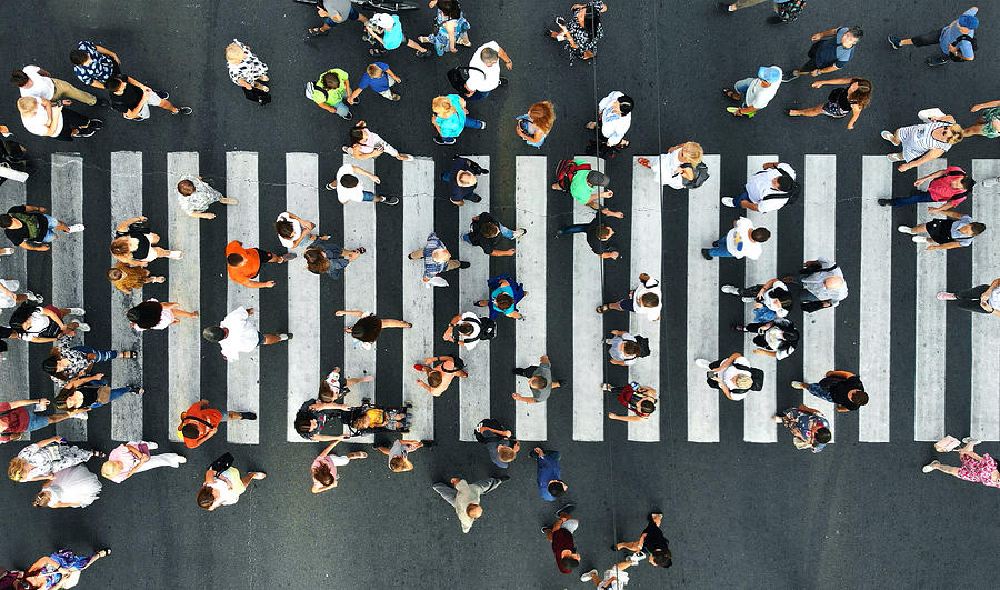 Aerial. Pedestrians on pedestrian crosswalk. Top view. Photograph by Dmytro Varavin