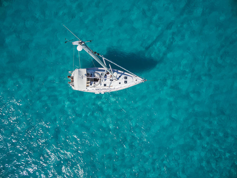 Aerial photo of sailboat anchored Photograph by Nisian Hughes