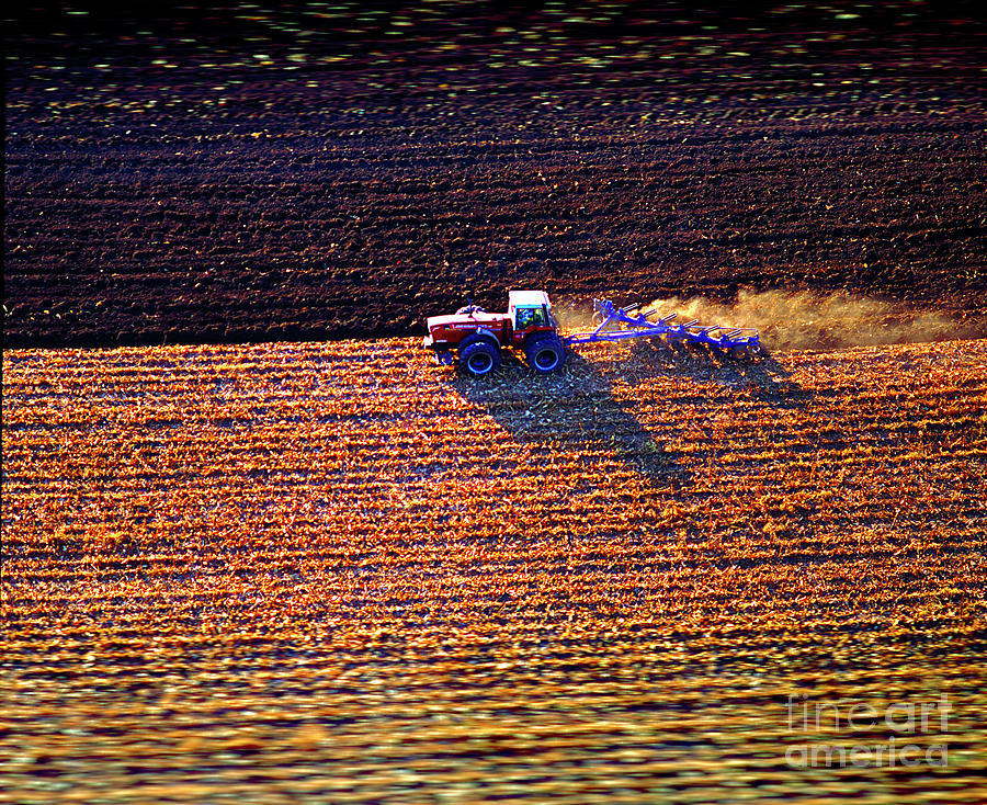 Aerial Red Tractor pulling disks Photograph by Tom Jelen