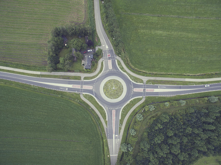 Aerial shot of a roundabout with the landscape around it. Photograph by Paula Daniëlse