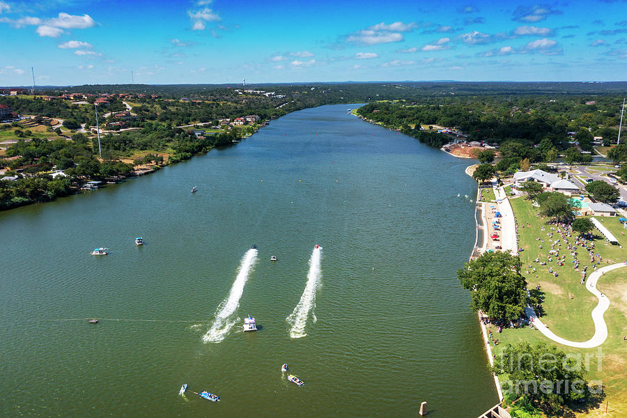Boat Photograph - Aerial view as Drag boats race across the starting line on Lake Marble Falls during the drag boat races at Lakefest in Marble Falls by Dan Herron