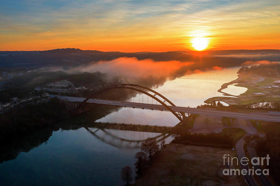 Austin Sunset Photograph - Aerial view of a beautiful golden sunrise paints the 360 Pennybacker Bridge by Dan Herron