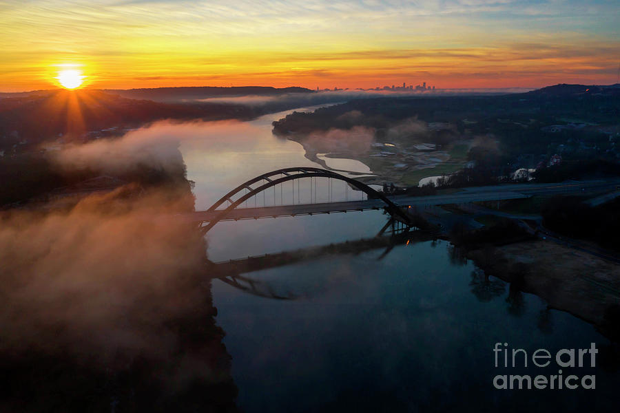 Austin Skyline Photograph - Aerial view of a beautiful sunrise greets the 360 Pennybacker Bridge by Dan Herron