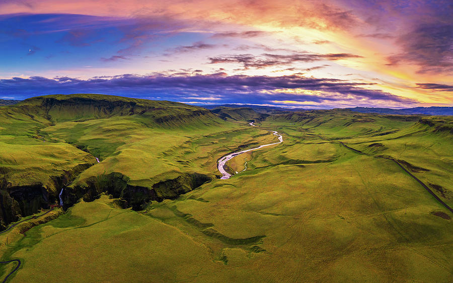Aerial view of a colorful sunset above Fjadrargljufur canyon in Iceland ...
