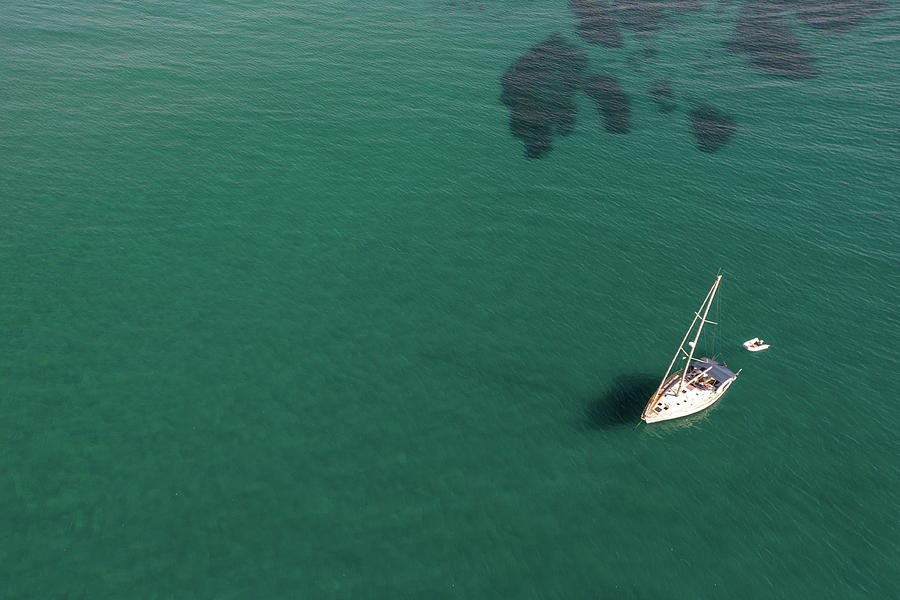 Aerial view of a luxury yacht anchored in the surface of the sea. Cyprus vacations Photograph by Michalakis Ppalis