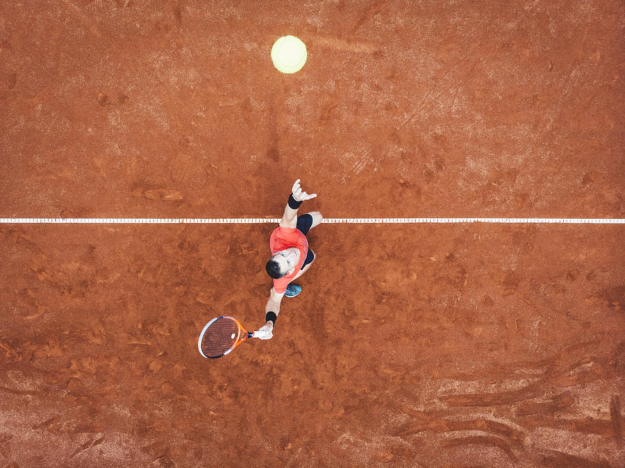 Aerial view of a tennis player on the court Photograph by Ziga Plahutar