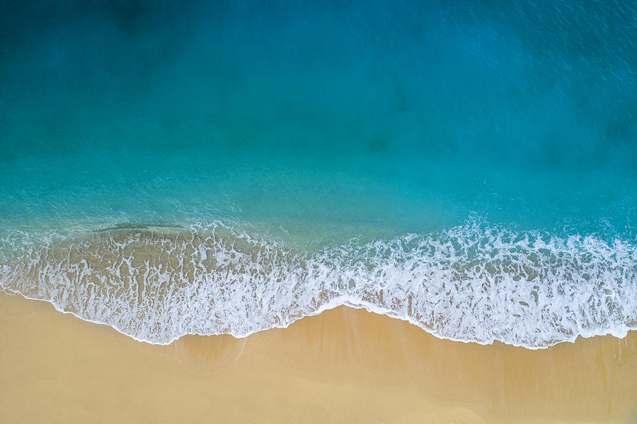 Aerial view of clear turquoise sea and waves Photograph by Hocus-focus
