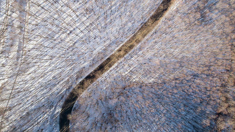Aerial View Of Curved Road In The Snowy Mountains. Top Down View Of Frozen Winter Forest And A Curvy Road Photograph