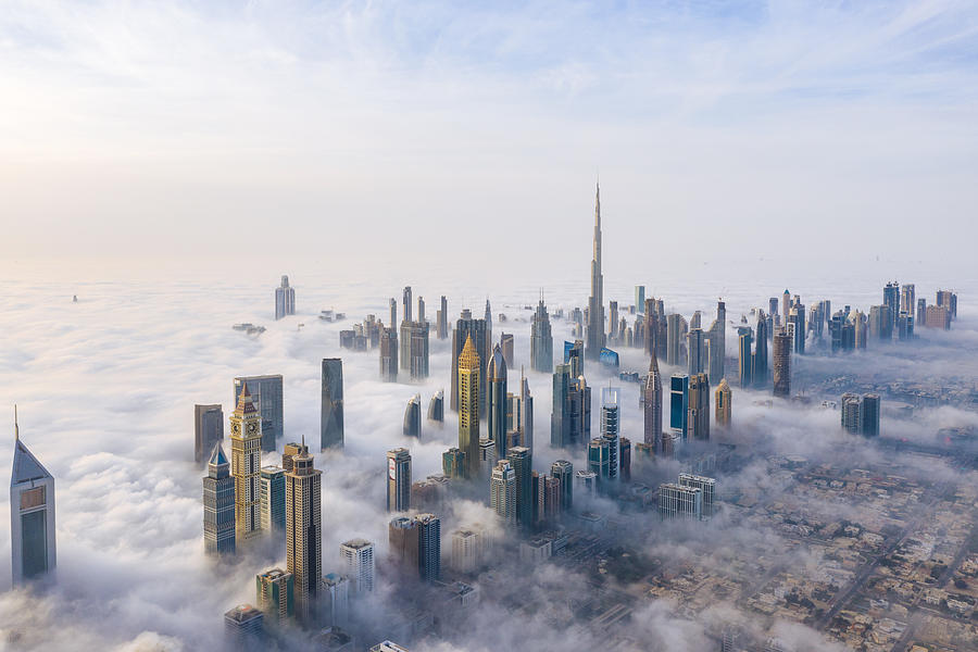 Aerial view of Dubai skyline covered in dense fog during winter season Photograph by Captured Blinks Photography
