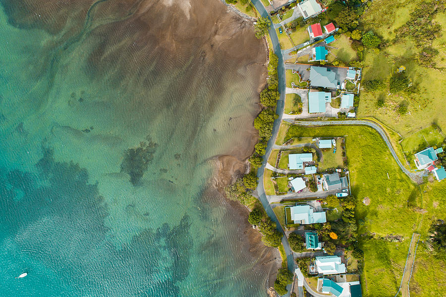 Aerial view of houses along the beach. Photograph by Nazar Abbas Photography