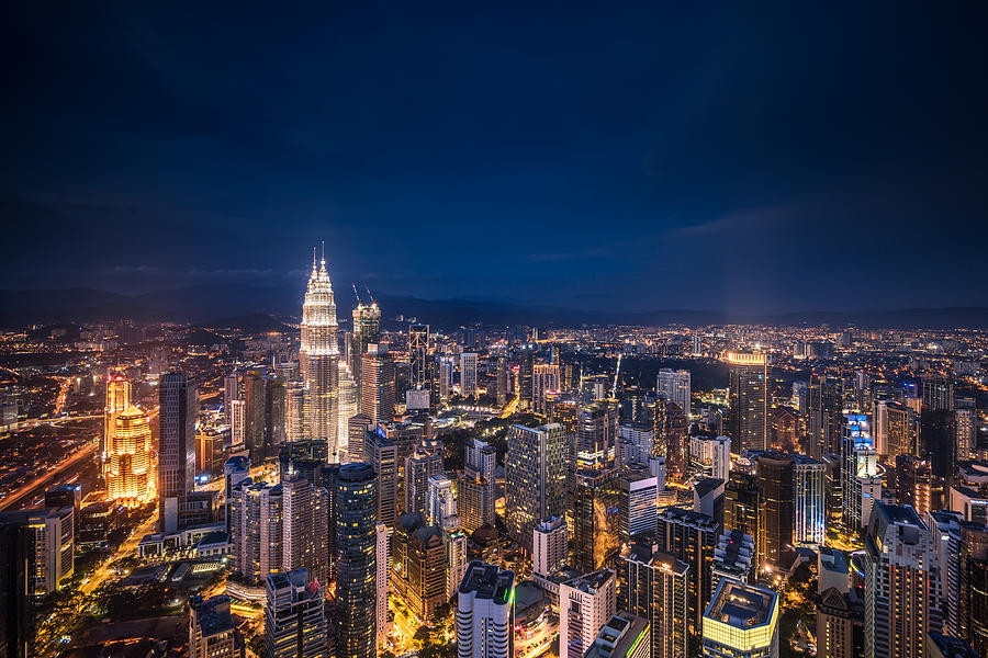 Aerial View of Kuala Lumpur Skyline at Night Photograph by Yongyuan Dai