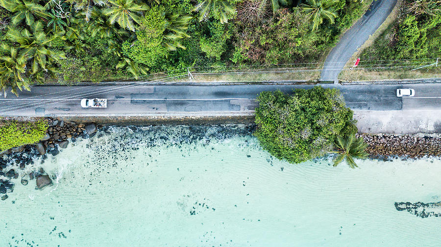 Aerial view of main road of Mahe Island on the sea - Seychelles Photograph by PJPhoto69