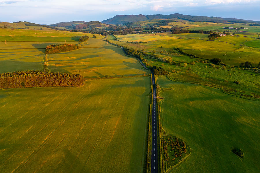 Aerial view of rural Scotland at sunset Photograph by JohnFScott