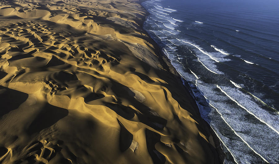 Aerial View of Sand Dunes and Ocean Photograph by Justinreznick