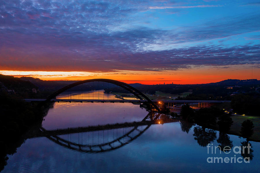 Sunset Photograph - Aerial view of the 360 Pennybacker Bridge and reflection over Lake Austin by Dan Herron