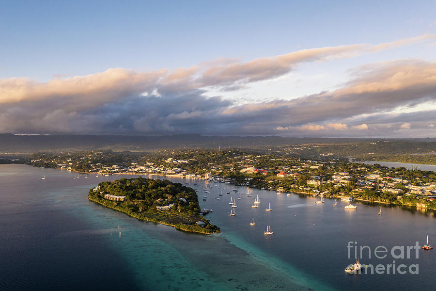 Aerial view of the sunset over the Port Vila bay and the Iririki Photograph by Didier Marti