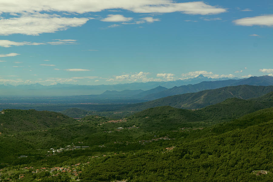 aerial view of val Padana with, in the background the skyline of Turin ...