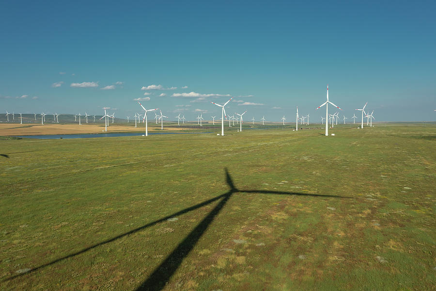 Aerial view of windmills and shadows in rotation Photograph by Mikhail Kokhanchikov