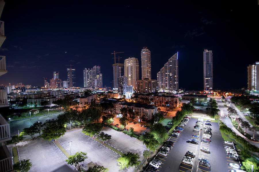 Aerial view Sunny Isles Beach long exposure during night time Photograph by Rod Gimenez