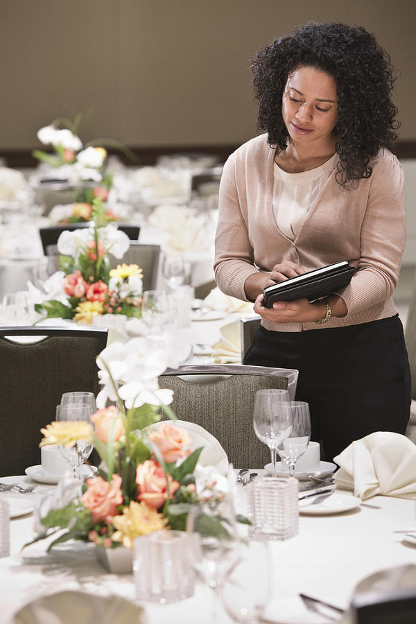 African American businesswoman working in dining room Photograph by Jetta Productions Inc