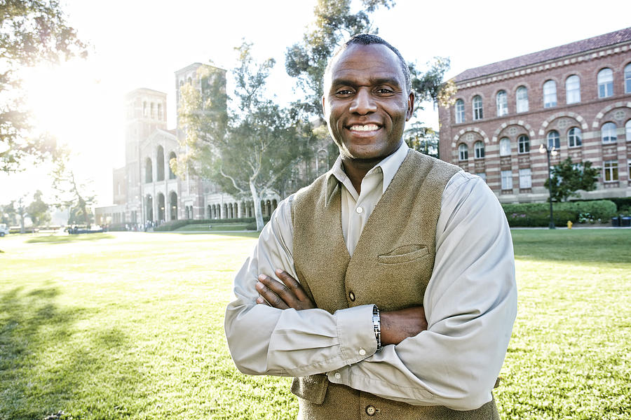 African American professor smiling on campus Photograph by Peathegee Inc