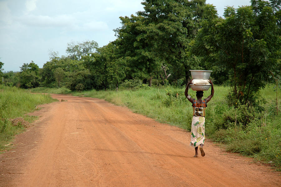 African Road - Woman & Water Photograph by Sean_Warren