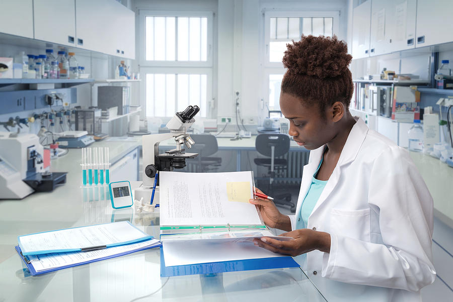 African scientist, medical worker or tech in modern laboratory Photograph by Anyaivanova