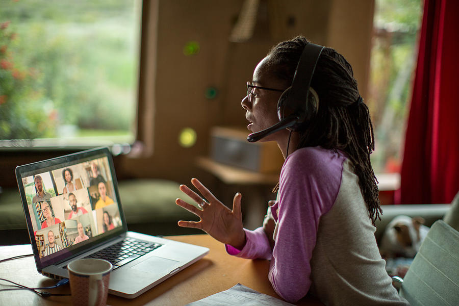 Afro-caribbean woman working from home during the Covid lockdown Photograph by Alistair Berg