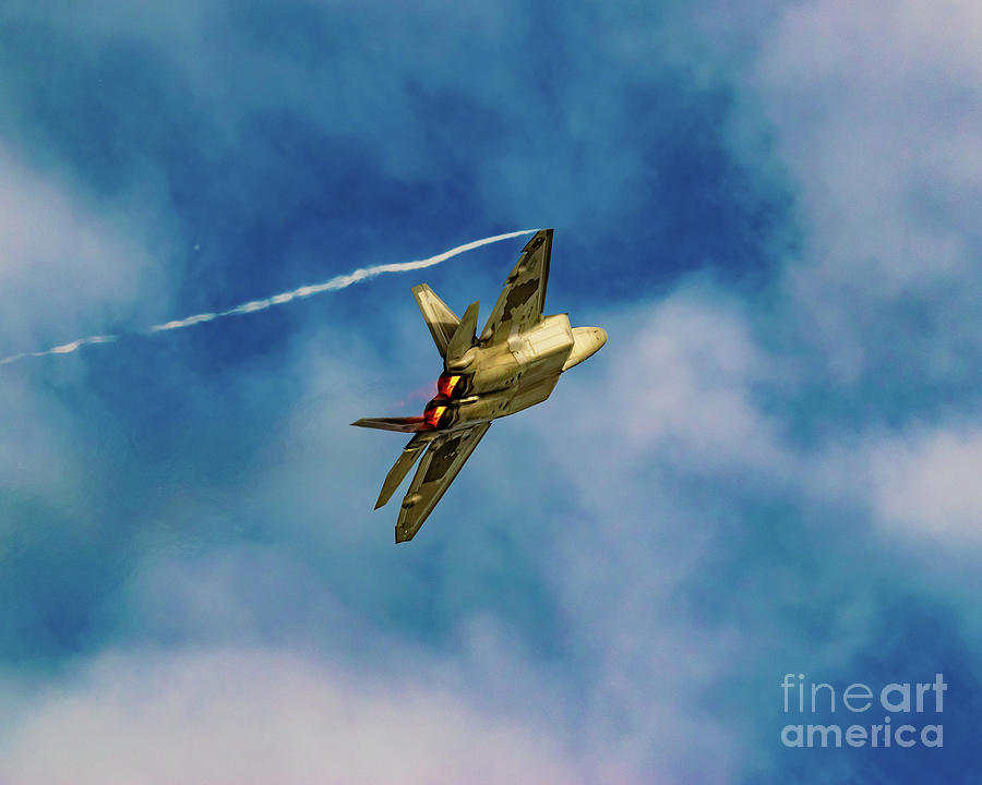 Anchorage Photograph - Afterburning F-22 Raptor Soaring Towards The Heavens by Joe Kunzler