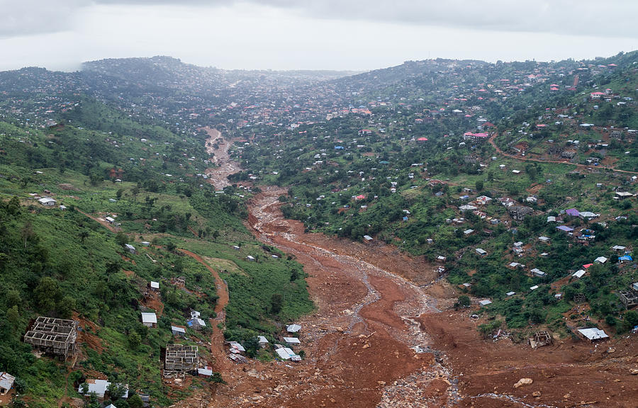 Aftermath of mudslide in Sierra Leone Photograph by Michael Duff Aftermath of mudslide in Sierra Leone Photograph by Michael Duff