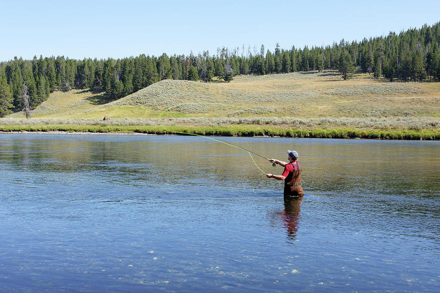 Ahhhh, West and Weewaxation at Wast -- Fisherman in Yellowstone National Park, Wyoming Photograph by Darin Volpe