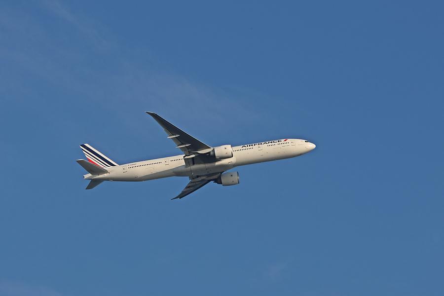 Air France 777-300ER in flight Photograph by Marlin and Laura Hum