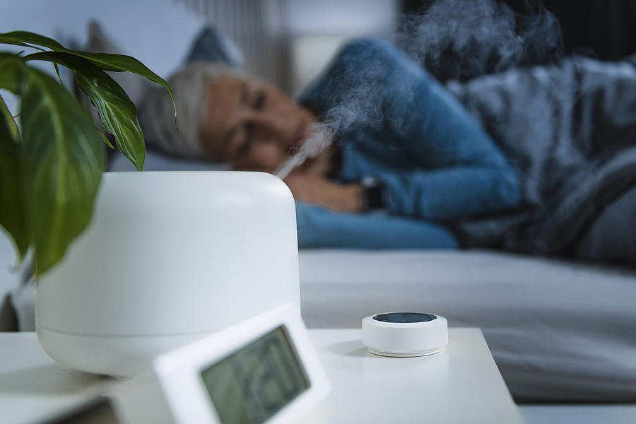 Air humidifier in bedroom Photograph by Microgen Images/science Photo Library