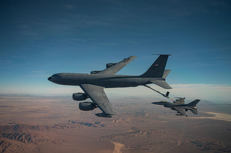 Air-to-air refueling  Photograph by Lawrence Christopher