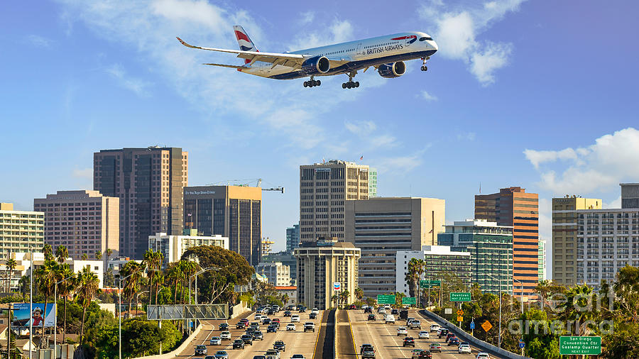 Airbus A350 flying over the San Diego skyline Photograph by Sam Antonio
