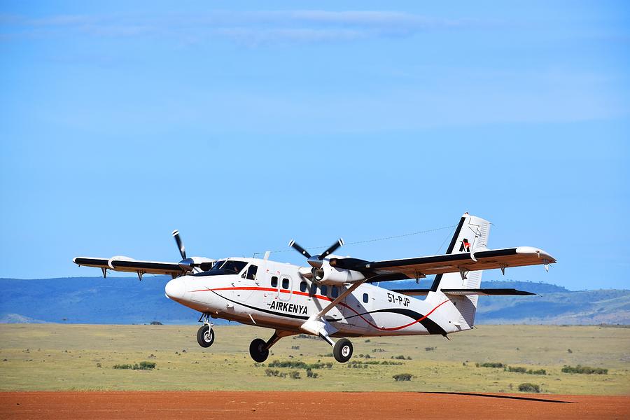 AirKenya Plane Taking Off Photograph by Marta Pawlowski - Pixels