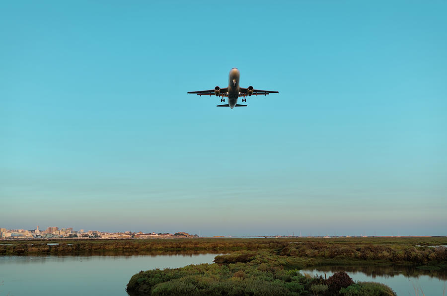 Airplane Approaching Faro Airport Photograph by Angelo DeVal
