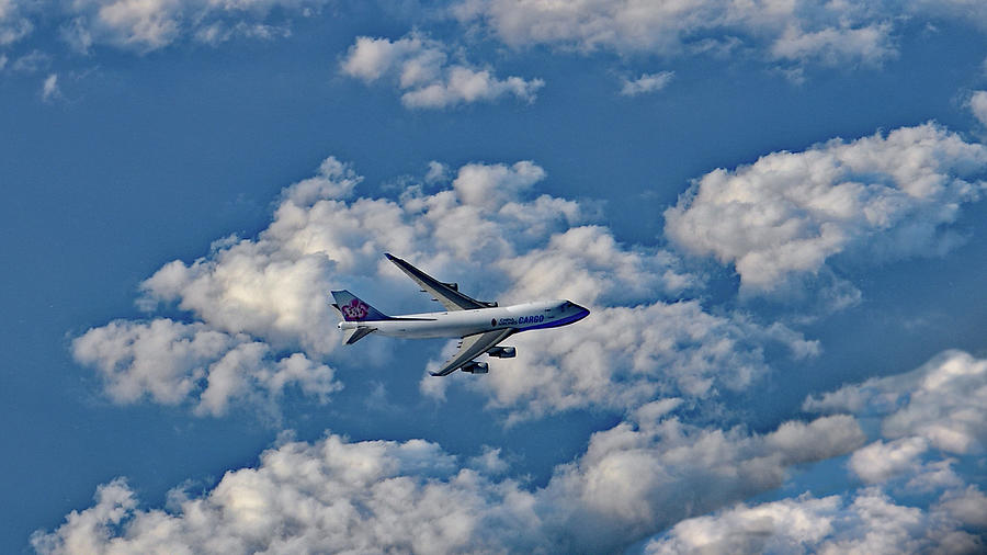 Airplane Cruising Above the Cloud Photograph by Amazing Action Photo Video