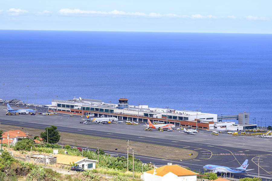 Airplane landing at Airport Cristiano Ronaldo on the Island Madeira, Portugal Photograph by Sjo