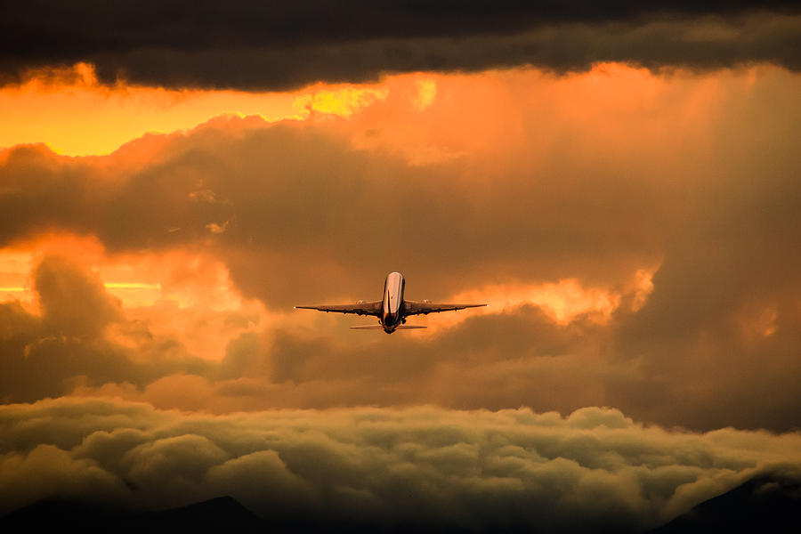 Airplane sunset Photograph by Serizawa