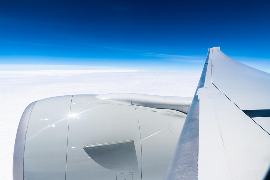 Airplane wing against clear blue sky Photograph by Mauro Tandoi
