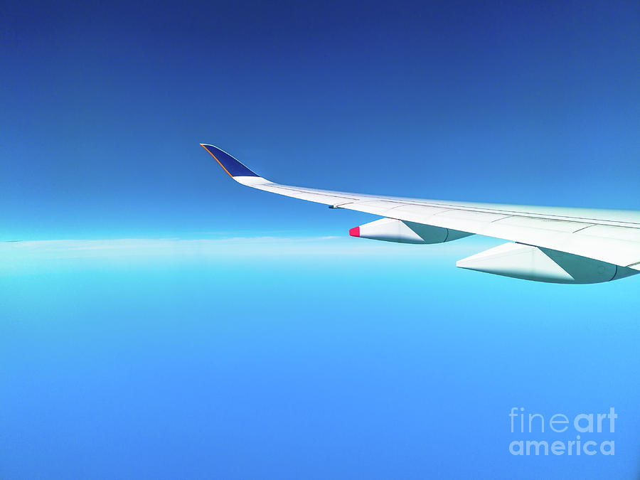 Airplane Wing In Clear Blue Sky Photograph by Benny Marty