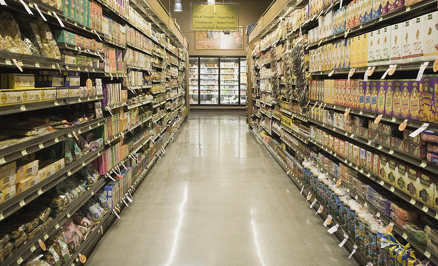 Aisle in grocery store Photograph by Andersen Ross