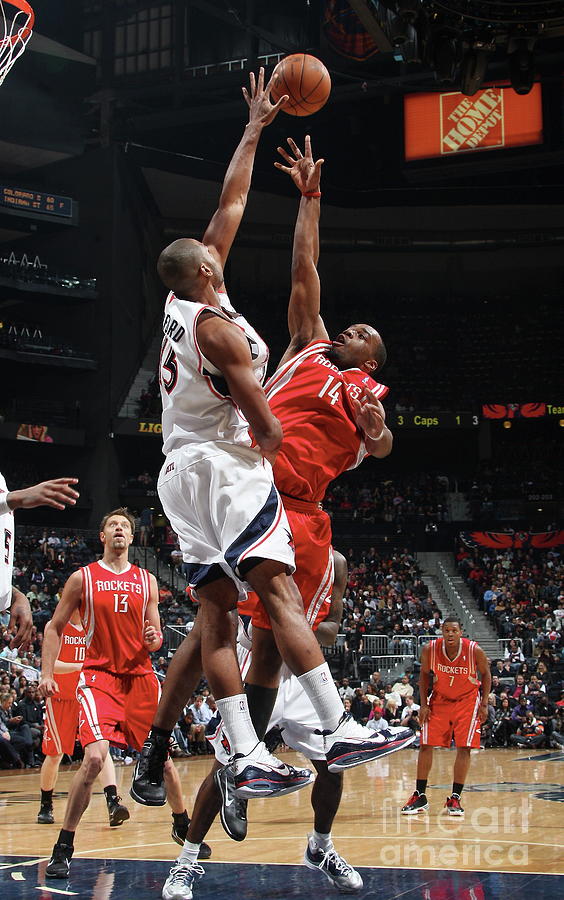 Al Horford and Carl Landry Photograph by Scott Cunningham