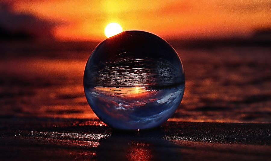 Alaska sunset though glass ball Photograph by David Ravenscroft - Fine ...