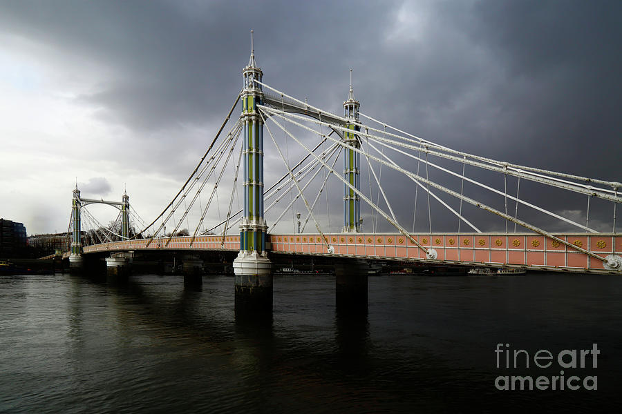 Albert Bridge and dark stormy skies London Photograph by James Brunker